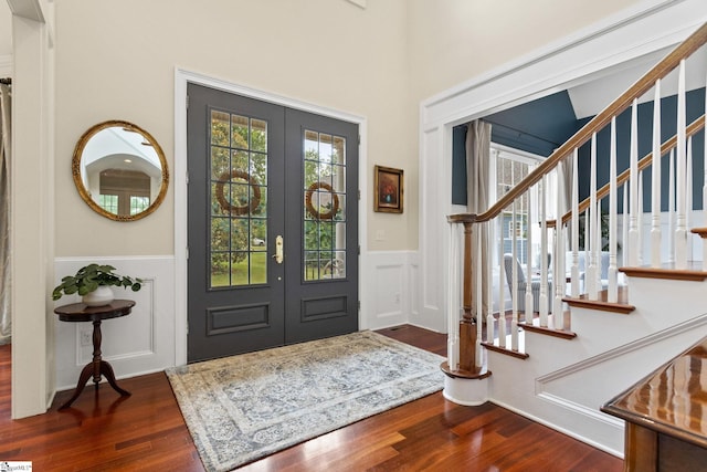 5 Fife Ct, Simpsonville, SC 29681 - entryway featuring wainscoting, french doors, wood finished floors, stairs, and a decorative wall