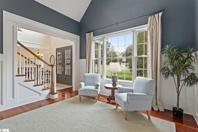 5 Fife Ct, Simpsonville, SC 29681 - sitting room with a chandelier, vaulted ceiling, wood finished floors, stairway, and healthy amount of natural light