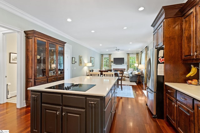 5 Fife Ct, Simpsonville, SC 29681 - kitchen featuring freestanding refrigerator, black electric stovetop, dark wood finished floors, light countertops, and crown molding