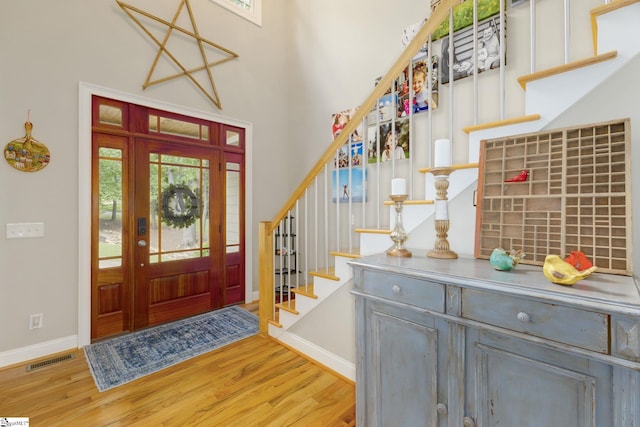 6 Terrapin Trl, Taylors, SC 29687 - foyer entrance with wood finished floors, baseboards, stairway, and a high ceiling