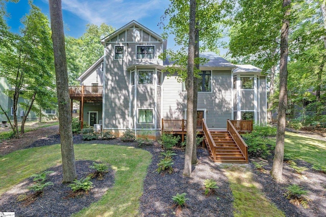 6 Terrapin Trl, Taylors, SC 29687 - rear view of property featuring stairway, a deck, and a lawn
