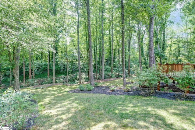 6 Terrapin Trl, Taylors, SC 29687 - view of grassy yard featuring a forest view and a deck