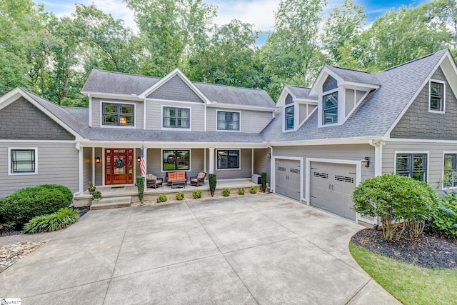 6 Terrapin Trl, Taylors, SC 29687 - view of front facade featuring a porch, driveway, an attached garage, and roof with shingles