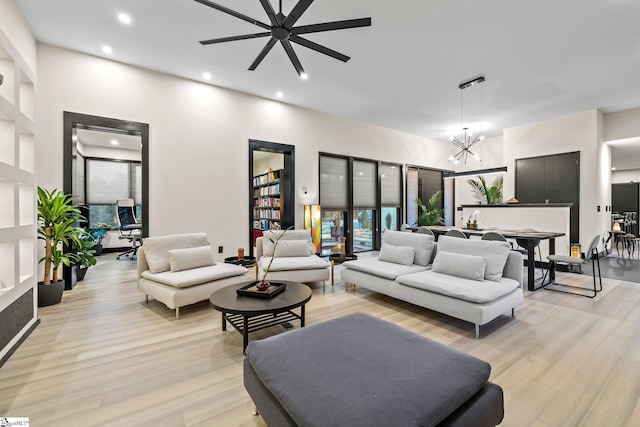 128 Sanctuary Ln, Taylors, SC 29687 - living area featuring a ceiling fan, light wood finished floors, recessed lighting, and a chandelier
