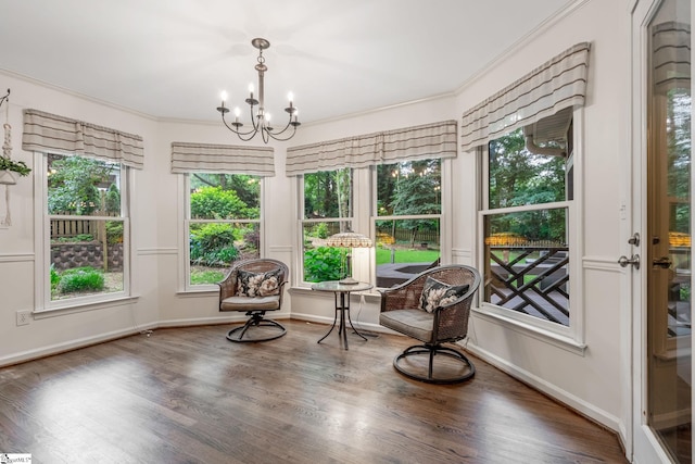 119 Circle Slope Dr, Simpsonville, SC 29681 - sunroom with a chandelier, wood finished floors, baseboards, and ornamental molding