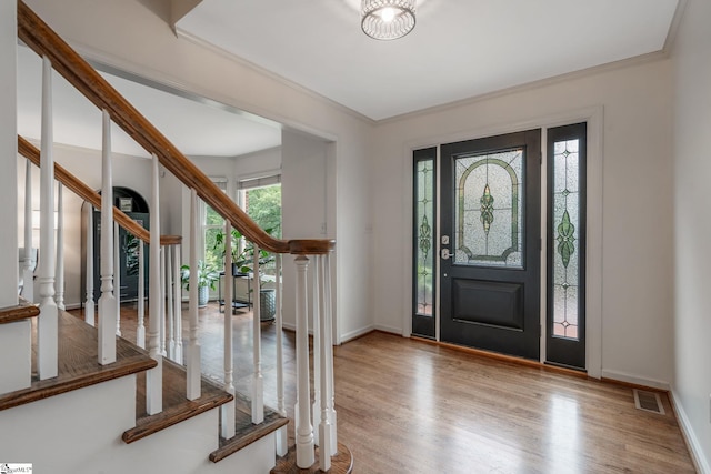 119 Circle Slope Dr, Simpsonville, SC 29681 - foyer with stairs, wood finished floors, ornamental molding, and baseboards