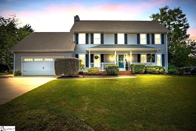 16 Chariot Ln, Simpsonville, SC 29681 - view of front of home featuring covered porch, an attached garage, a chimney, concrete driveway, and a front lawn