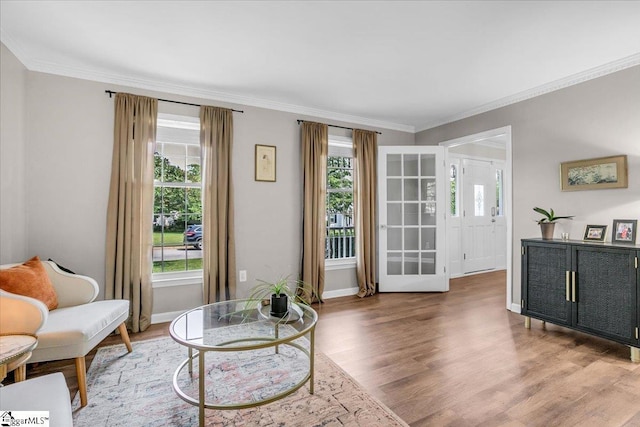 16 Chariot Ln, Simpsonville, SC 29681 - living room with plenty of natural light, light wood-type flooring, crown molding, and baseboards