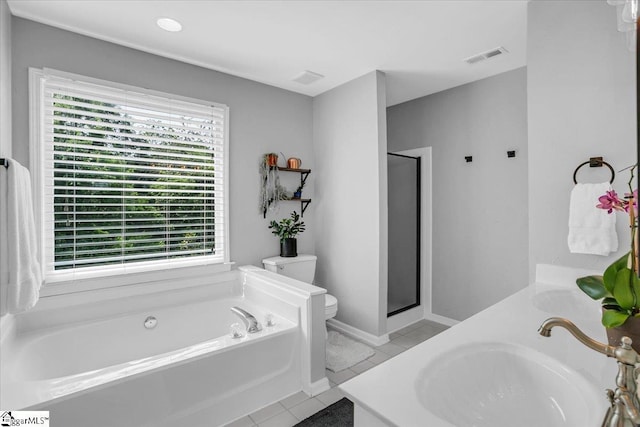 16 Chariot Ln, Simpsonville, SC 29681 - bathroom with toilet, a garden tub, tile patterned flooring, and vanity