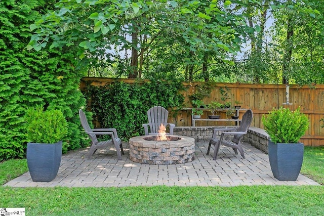 16 Chariot Ln, Simpsonville, SC 29681 - view of patio / terrace with an outdoor fire pit
