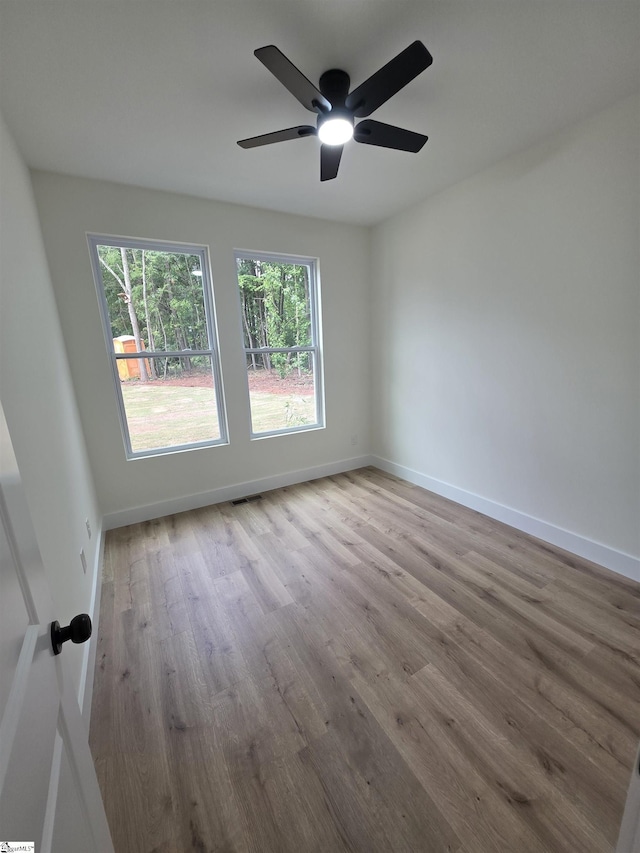 2014 Driftwood Way, Anderson, SC 29625 - unfurnished room with wood finished floors, baseboards, and ceiling fan