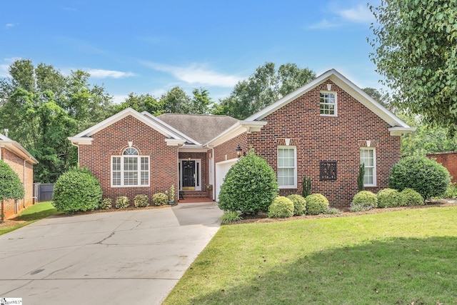 17 Bradford N Way, Greenville, SC 29617 - traditional-style house with brick siding, an attached garage, and concrete driveway