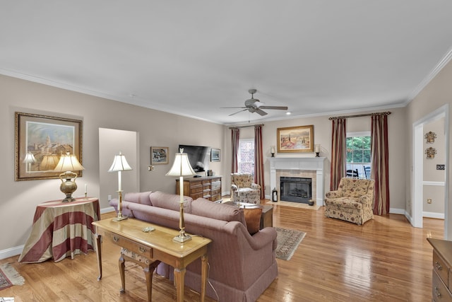 17 Bradford N Way, Greenville, SC 29617 - living area with a ceiling fan, ornamental molding, light wood finished floors, baseboards, and a tile fireplace