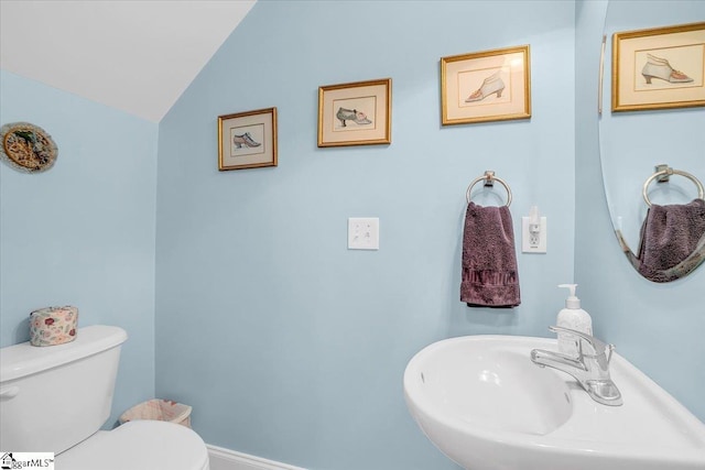 30 Chalice Hill Ln, Travelers Rest, SC 29690 - half bathroom with a sink, toilet, and lofted ceiling