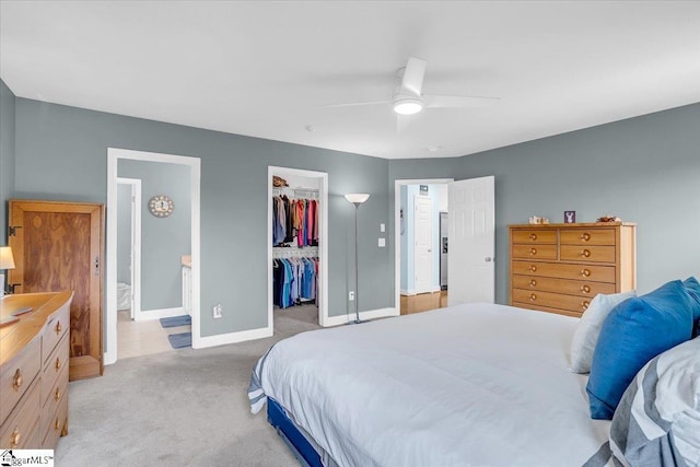 30 Chalice Hill Ln, Travelers Rest, SC 29690 - bedroom featuring baseboards, a closet, light carpet, a walk in closet, and a ceiling fan