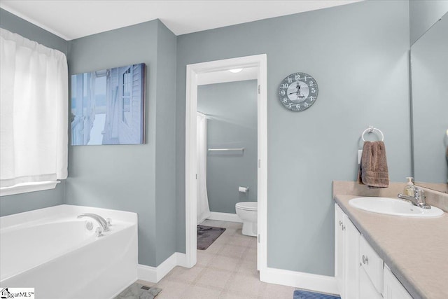 30 Chalice Hill Ln, Travelers Rest, SC 29690 - bathroom with vanity, baseboards, a garden tub, and toilet