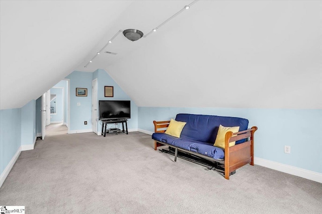 30 Chalice Hill Ln, Travelers Rest, SC 29690 - sitting room featuring rail lighting, baseboards, vaulted ceiling, and carpet