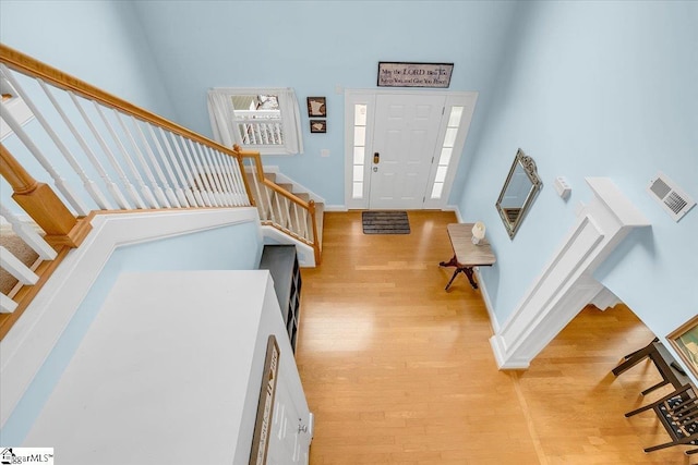 30 Chalice Hill Ln, Travelers Rest, SC 29690 - foyer with stairs, light wood-style flooring, a high ceiling, and baseboards