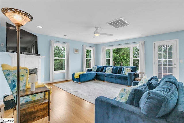 30 Chalice Hill Ln, Travelers Rest, SC 29690 - living room featuring ceiling fan, wood finished floors, a fireplace, recessed lighting, and baseboards