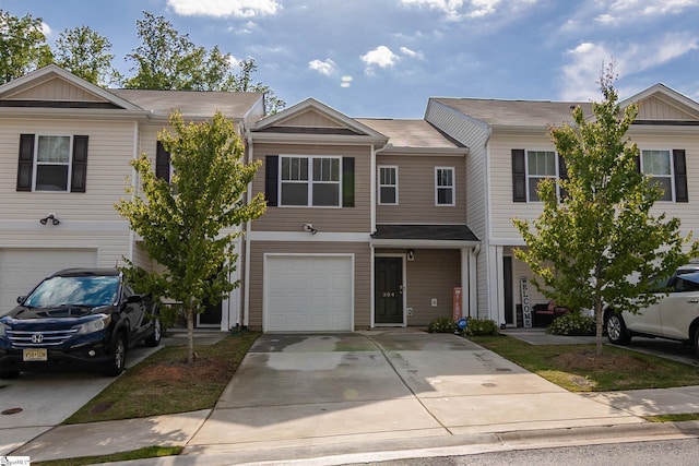 304 Oakmont Valley Trl, Seneca, SC 29678 - townhome / multi-family property with a garage, concrete driveway, and board and batten siding