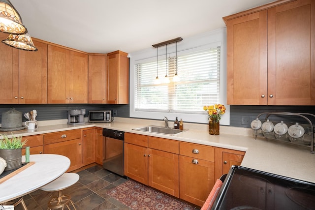 201 W Highland Ave, Anderson, SC 29625 - kitchen featuring stainless steel appliances, a sink, light countertops, pendant lighting, and ornamental molding