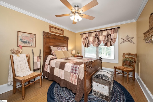 201 W Highland Ave, Anderson, SC 29625 - bedroom with light wood finished floors, ornamental molding, baseboards, and ceiling fan