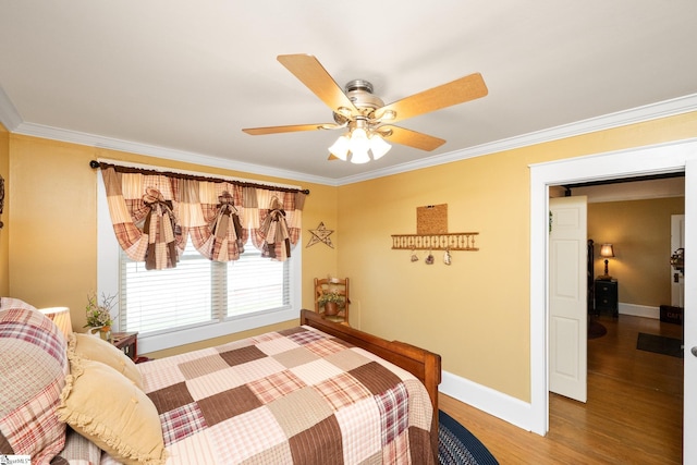 201 W Highland Ave, Anderson, SC 29625 - bedroom featuring crown molding, baseboards, wood finished floors, and ceiling fan