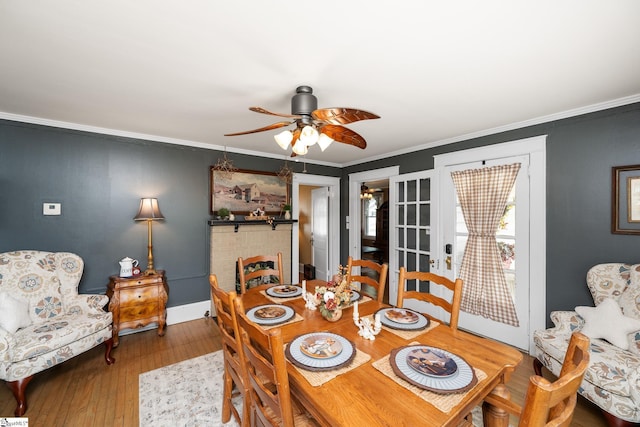 201 W Highland Ave, Anderson, SC 29625 - dining space with a ceiling fan, ornamental molding, wood finished floors, baseboards, and french doors