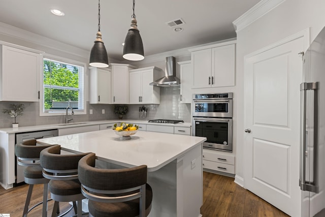 712 Paxton Rose Dr, Greer, SC 29650 - kitchen featuring wall chimney range hood, a sink, appliances with stainless steel finishes, light countertops, and recessed lighting