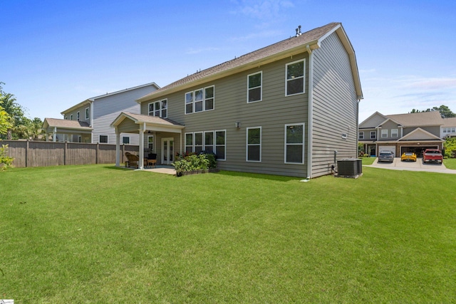 712 Paxton Rose Dr, Greer, SC 29650 - rear view of house featuring central AC and a patio