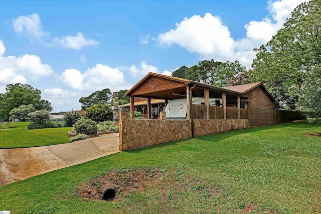 101 Myrtle St, Lavonia, GA 30553 - view of front of property with stone siding, concrete driveway, and metal roof