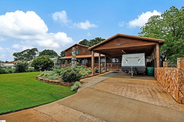 101 Myrtle St, Lavonia, GA 30553 - view of front facade with concrete driveway, a front lawn, and a detached carport