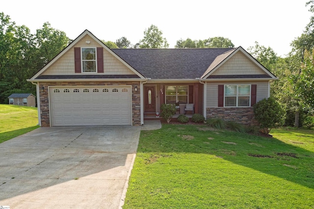 314 Hallie Olivia Dr, Inman, SC 29349 - view of front of property featuring stone siding, a porch, concrete driveway, and a front lawn