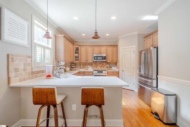 9 Windswept Knoll Dr, Taylors, SC 29687 - kitchen with appliances with stainless steel finishes, a sink, a peninsula, decorative backsplash, and glass insert cabinets