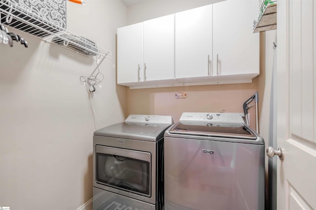 9 Windswept Knoll Dr, Taylors, SC 29687 - laundry area featuring cabinet space and separate washer and dryer