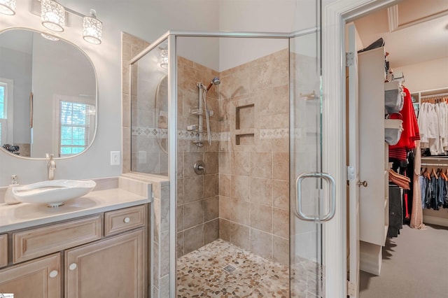 9 Windswept Knoll Dr, Taylors, SC 29687 - bathroom featuring a shower stall, vanity, and a walk in closet