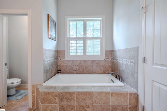 9 Windswept Knoll Dr, Taylors, SC 29687 - bathroom featuring toilet, a bath, and tile patterned flooring