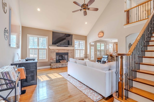 9 Windswept Knoll Dr, Taylors, SC 29687 - living area featuring a ceiling fan, healthy amount of natural light, stairs, a fireplace, and recessed lighting
