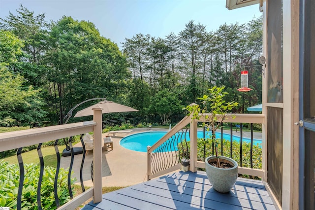9 Windswept Knoll Dr, Taylors, SC 29687 - balcony featuring view of pool area, view of scattered trees, and a patio area