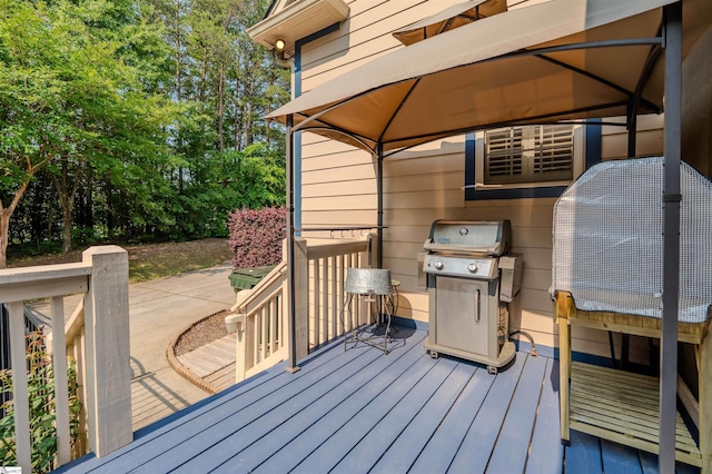 9 Windswept Knoll Dr, Taylors, SC 29687 - wooden deck with grilling area and a gazebo