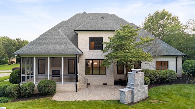 601 Brixton Cir, Simpsonville, SC 29681 - rear view of house with a sunroom, a shingled roof, a lawn, and brick siding