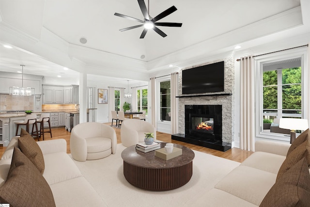 601 Brixton Cir, Simpsonville, SC 29681 - living area featuring healthy amount of natural light, a ceiling fan, light wood-type flooring, recessed lighting, and crown molding