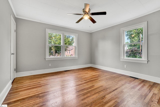 503 Davidson St, Clinton, SC 29325 - spare room featuring ornamental molding, wood finished floors, a ceiling fan, and baseboards