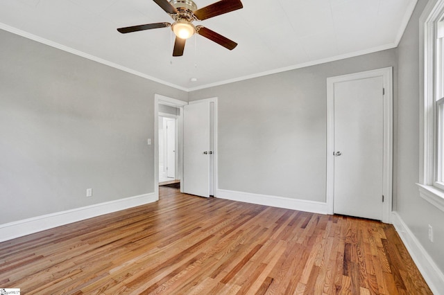 503 Davidson St, Clinton, SC 29325 - spare room with light wood finished floors, baseboards, ceiling fan, and ornamental molding