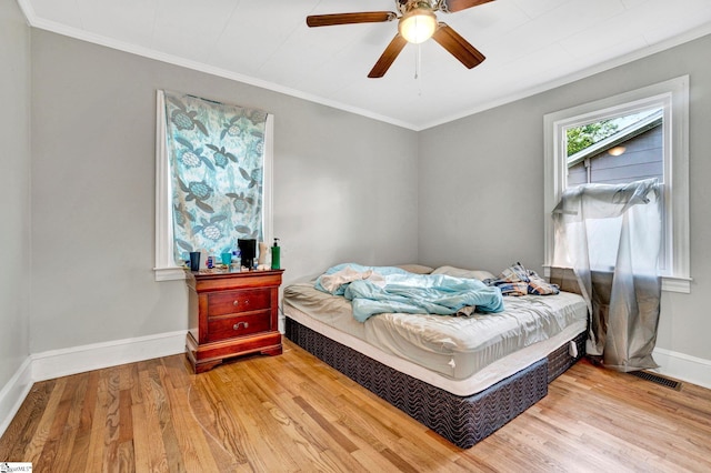 503 Davidson St, Clinton, SC 29325 - bedroom featuring wood finished floors, ornamental molding, baseboards, and ceiling fan