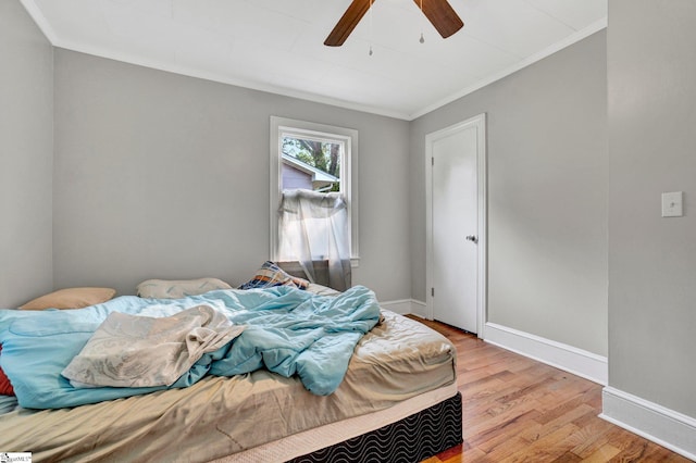 503 Davidson St, Clinton, SC 29325 - bedroom with ornamental molding, light wood-type flooring, baseboards, and ceiling fan