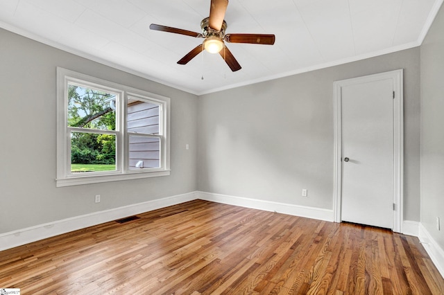 503 Davidson St, Clinton, SC 29325 - unfurnished room featuring wood finished floors, baseboards, ornamental molding, and a ceiling fan