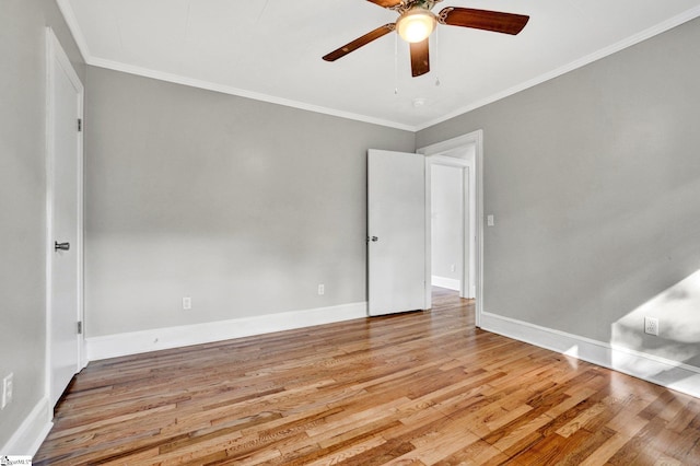 503 Davidson St, Clinton, SC 29325 - spare room featuring a ceiling fan, light wood finished floors, crown molding, and baseboards