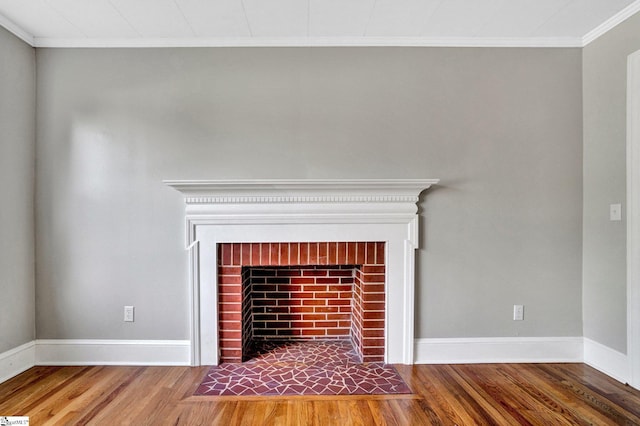 503 Davidson St, Clinton, SC 29325 - detailed view of ornamental molding, wood finished floors, baseboards, and a fireplace