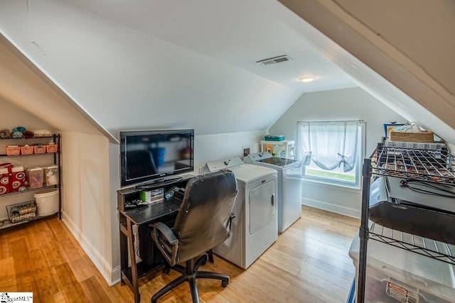 6913 White Horse Rd, Greenville, SC 29611 - home office with separate washer and dryer, light wood-type flooring, lofted ceiling, and baseboards